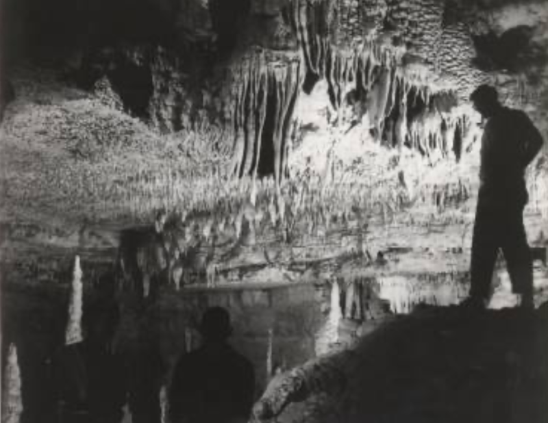 Man stands in Wonder World Cave