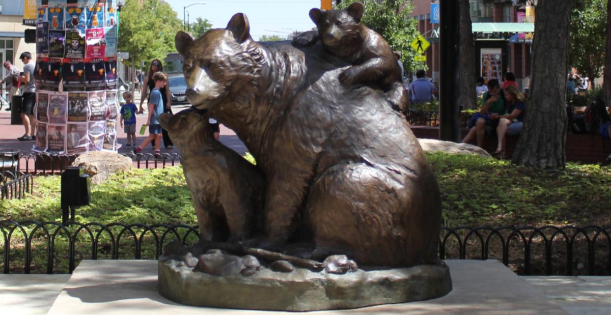 Statue of a mother bear with her cubs, Bear Hugs