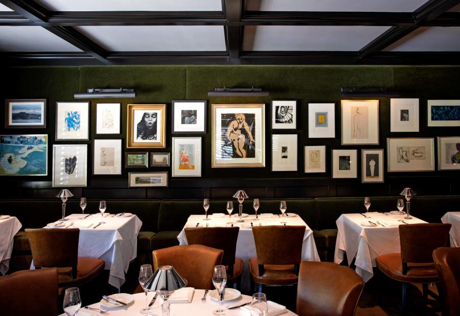 Interior dining room at Selby's with artwork on display