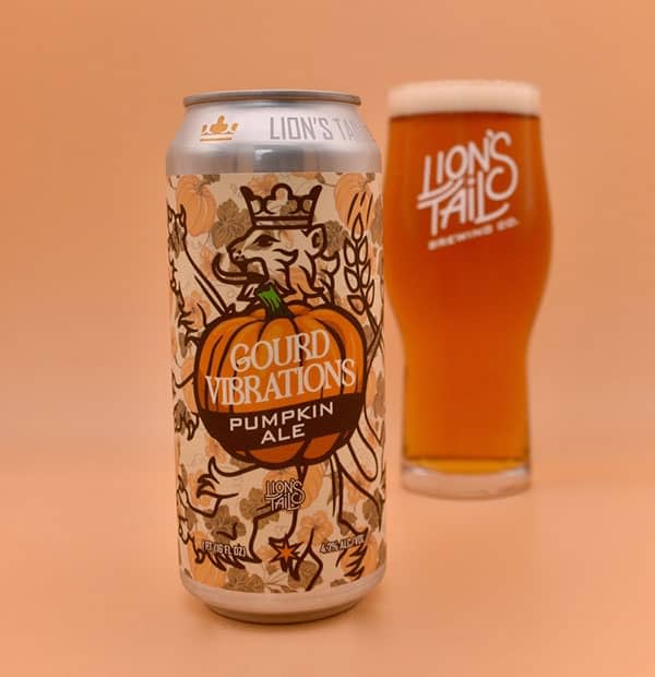 Gourd Vibrations Pumpkin Ale by Lion's Tail, with the can in the foreground and a full pint glass in the background.