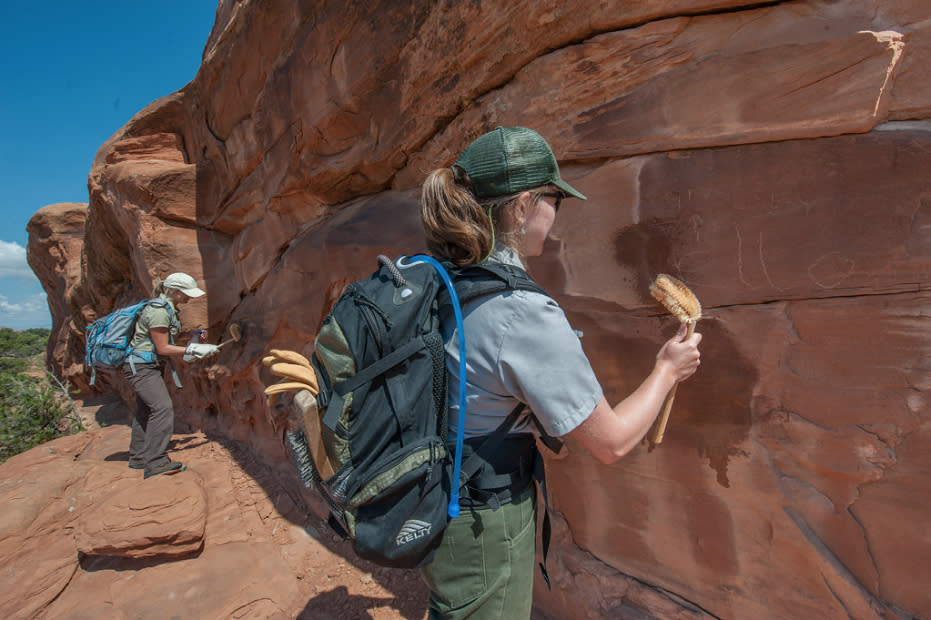Removing graffiti from sandstone walls in Arches National Park - Photo courtesy of NPS