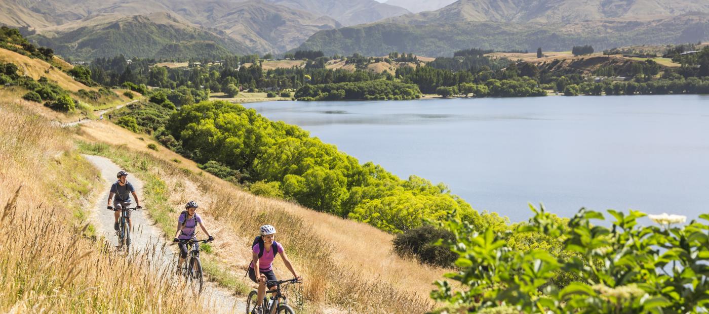 Friends Biking Around Lake Hayes in Summer