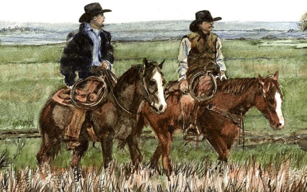 Two cowboys scan the sky at Circle K Trail Rides in Fredericksburg, TX