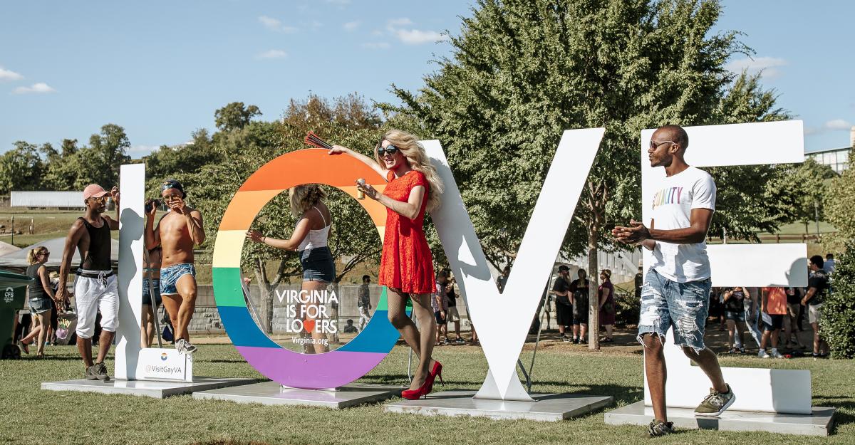People Posing At A "Love" sign at LGBT Pridefest in Richmond, VA