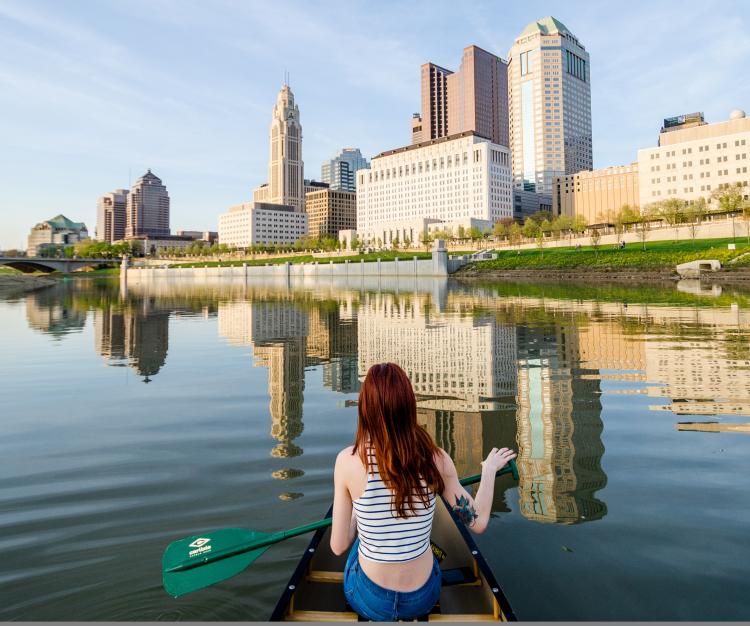 Girl kayaking on the Scioto River in Columbus