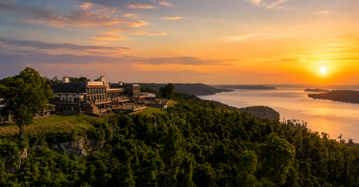 sunset at lake guntersville state park overlooking the lake with the lodge on the bluff
