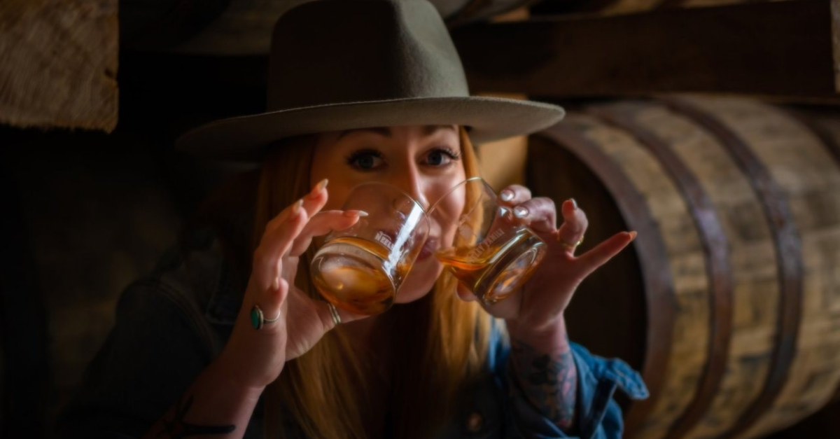 woman drinking bourbon