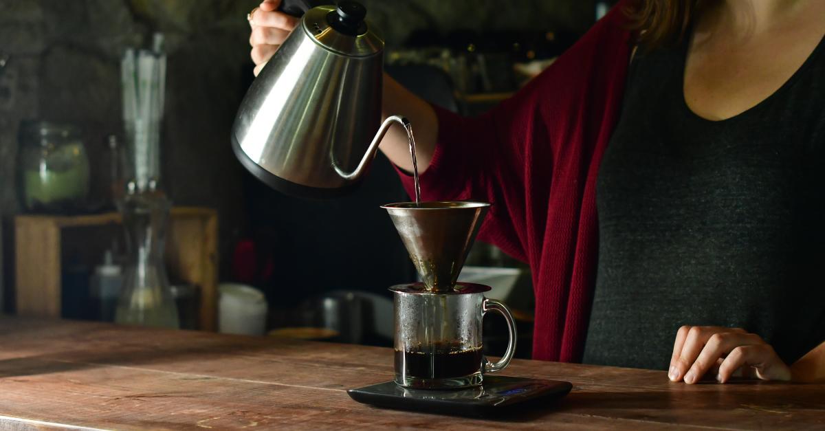 Barista making coffee pour-over