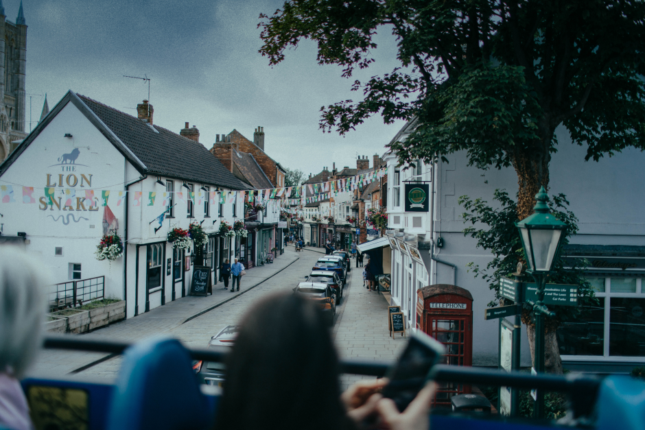 overview of the Lion and Snake pub from a tour bus