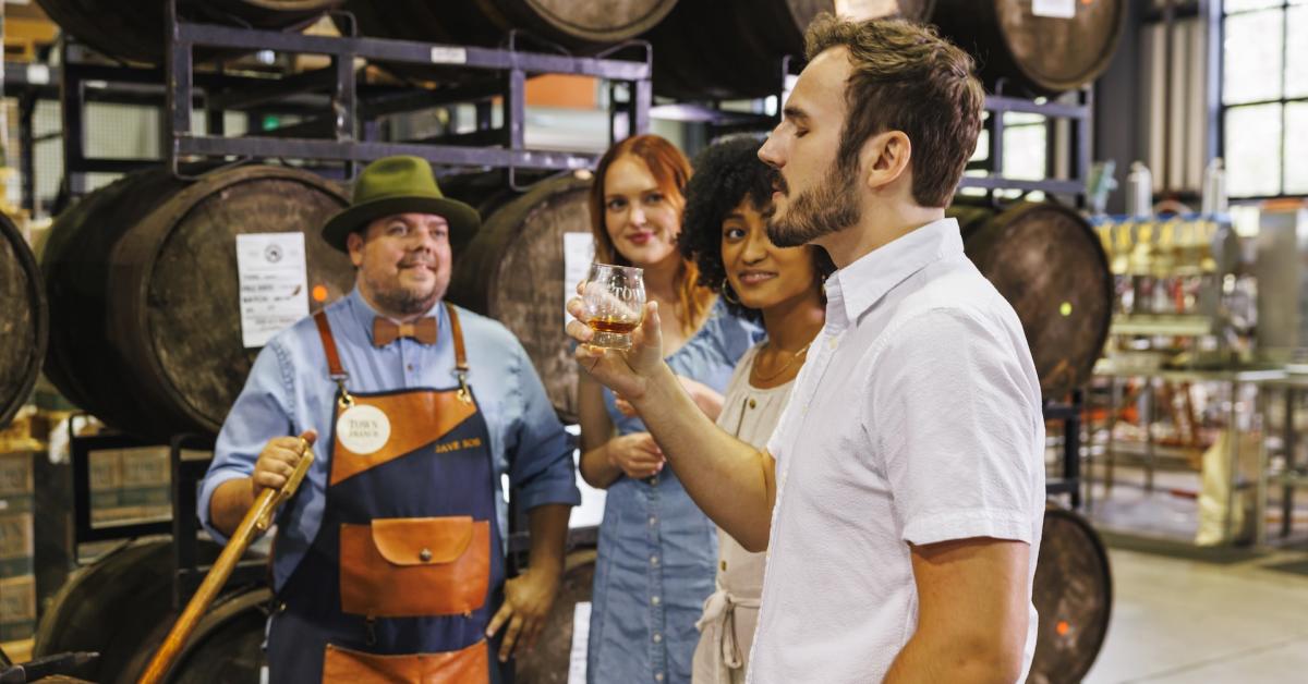 Group of people trying bourbon on the Brewgrass Trail