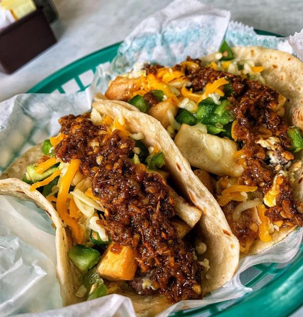 Breakfast Tacos with chorizo, egg, cheese and potatoe at Carmelo's Mexican Grill