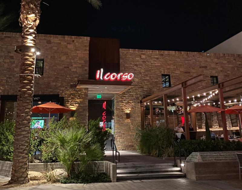 Exterior of Il Corso at night, and Italian restaurant in Palm Springs