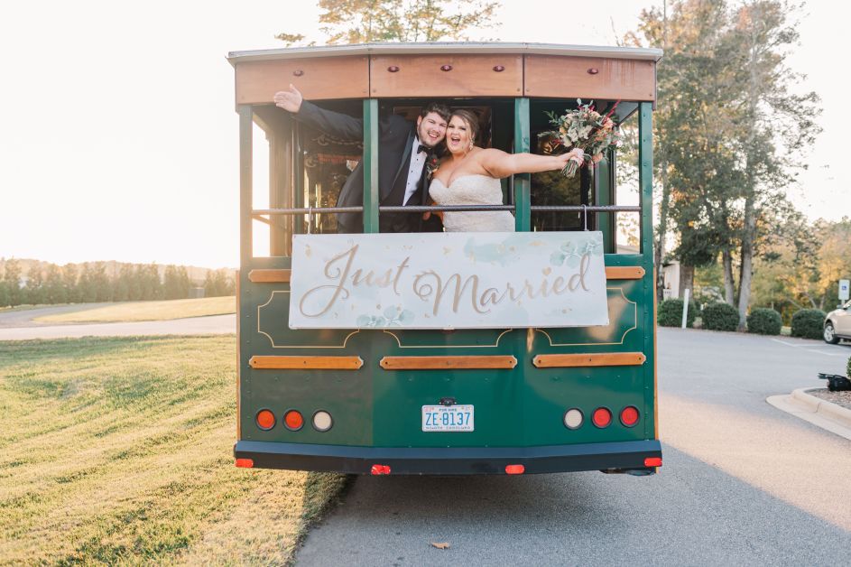 Wedding couple on back of trolley