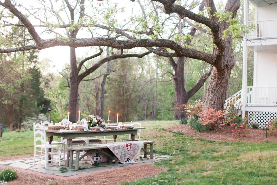 Picnic table set up for wedding on farm