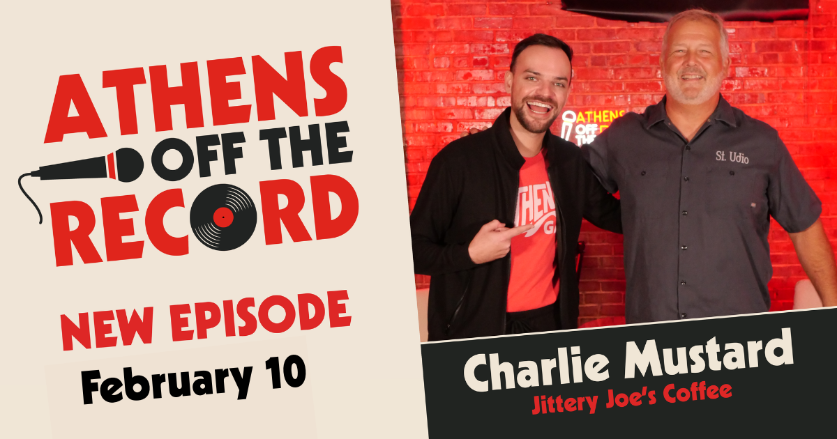 Cameron Jay Harrelson poses with Charlie Mustard of Jittery Joes.