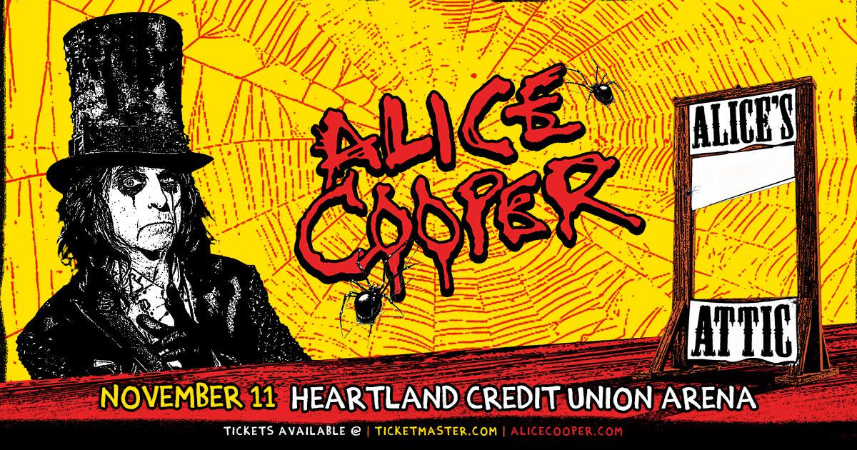 Alice Cooper is photographed wearing his signature black and white makeup and a black tophat.