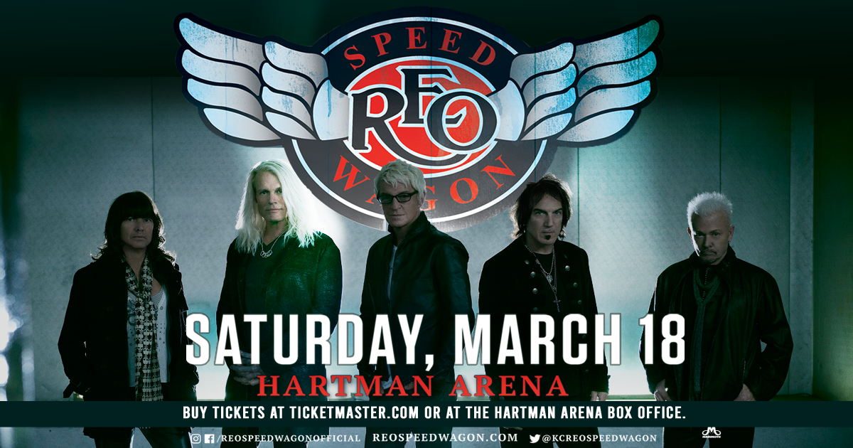 Band members of REO Speedwagon post for a concert poster