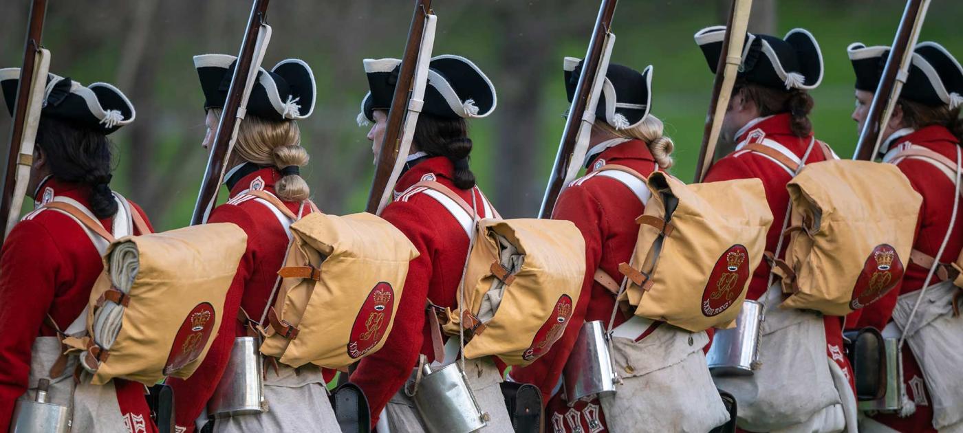 revolutionary war reenactment soldiers in a line