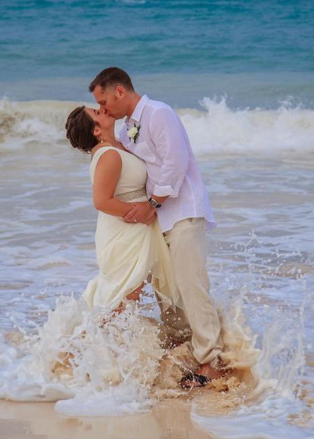 Couple kissing on the beach