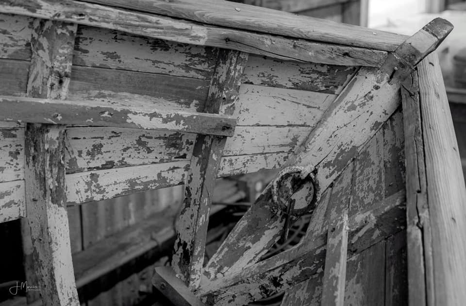 A black and white close up photo of a Farley boat helm.