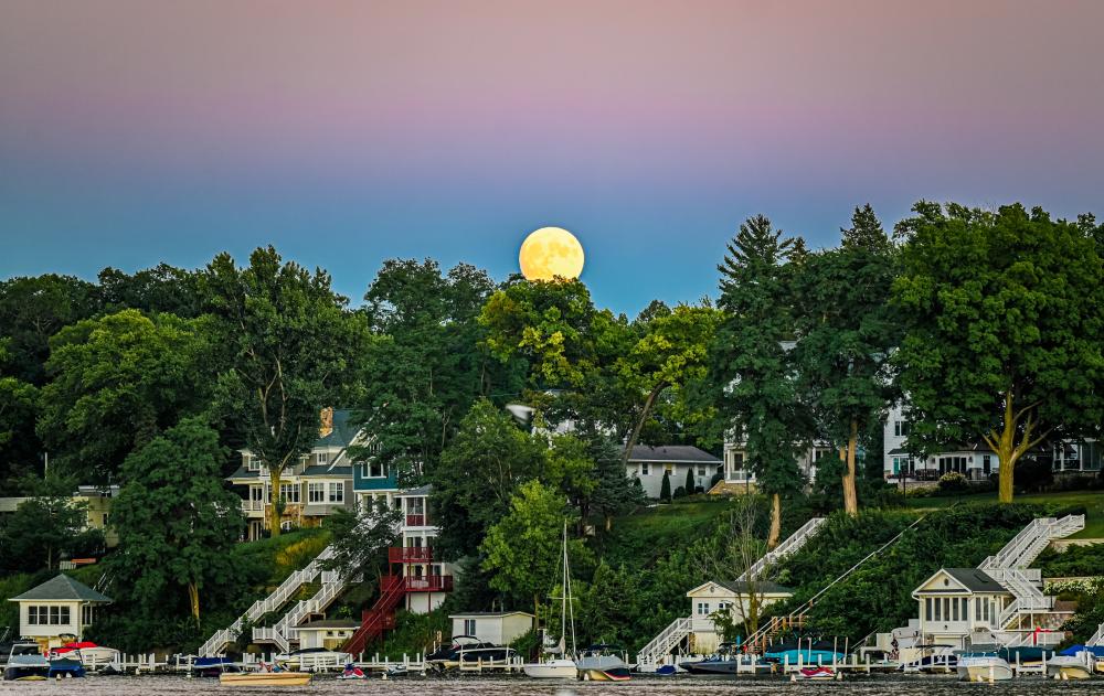 Rising moon over the homes along the shores of Geneva Lake