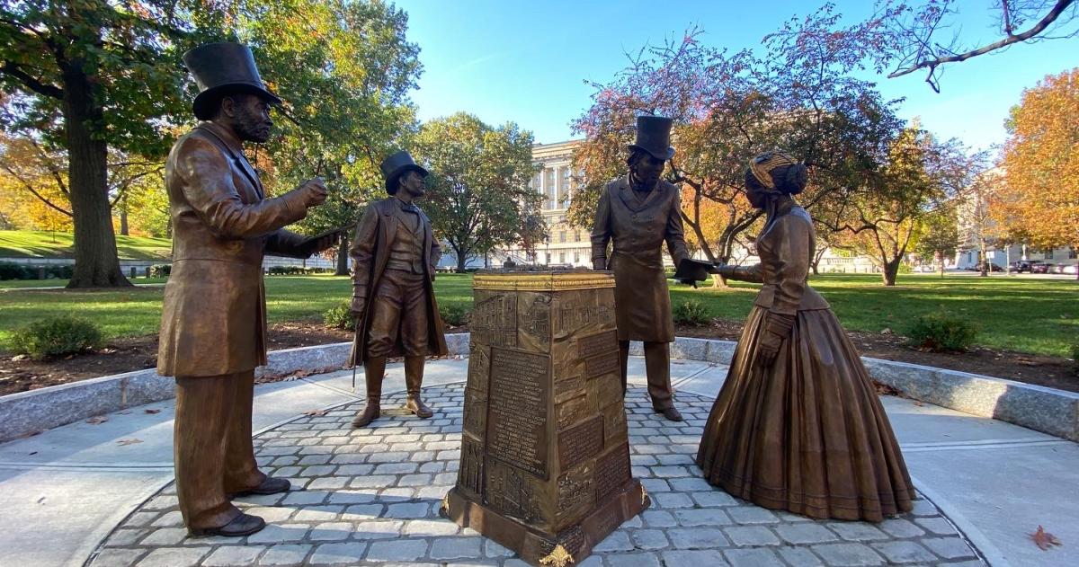 A Bronze Sculpture depicting Harrisburg residents discussing the passage of the 15th Amendment