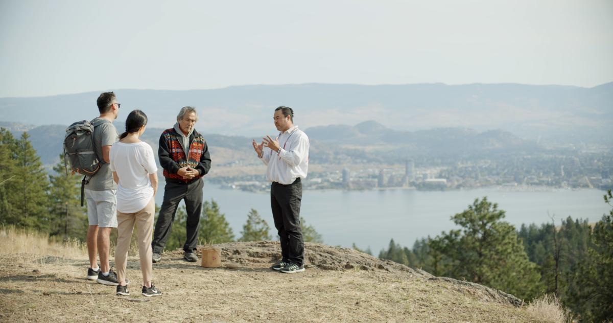 People Listening To A Tour Guide During A Moccasin Trails Guided Tour In Kelowna, BC