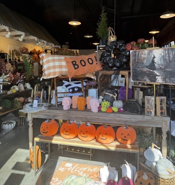 Creative Kitchen in Fort Smith always showcases seasonal displays, like a fall themed display with jack-o-lanterns, pillows, sugar skulls, and more.