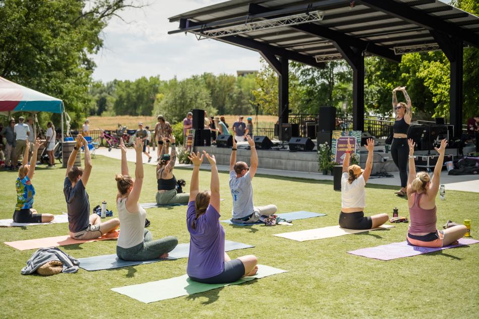 People doing Yoga on New Belgium Brewery's grass turf