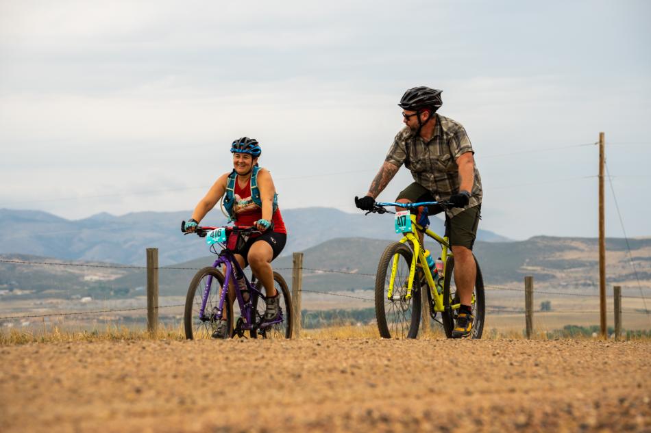 Bikers riding on a gravel road