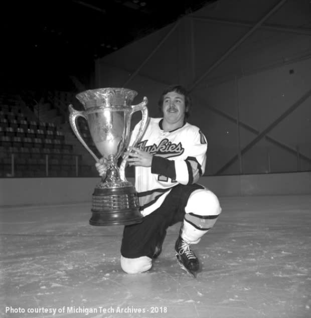 Player Bill Steele poses with MacNaughton Cup in 1974.
