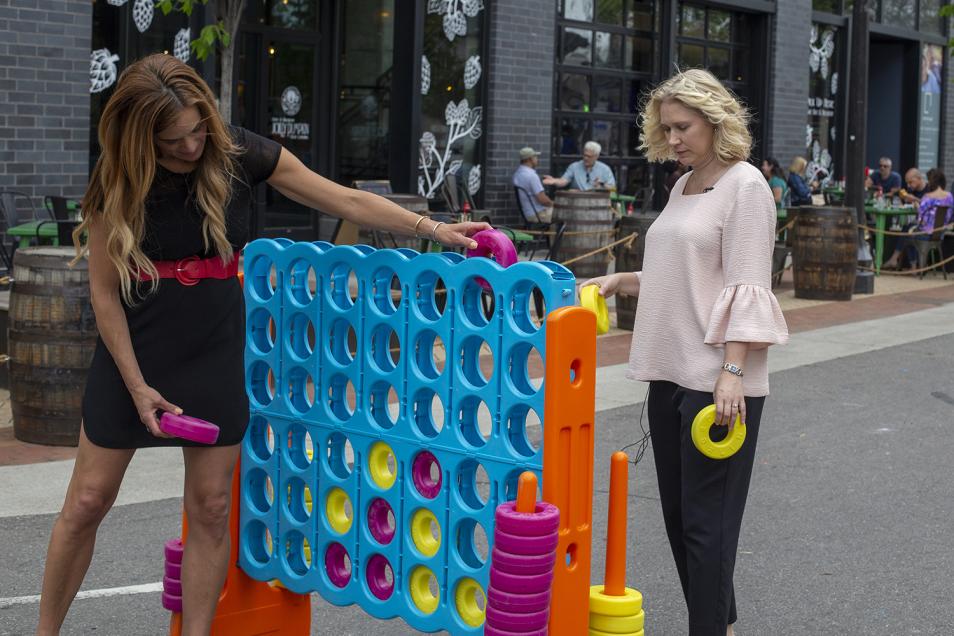 Two people playing connect four