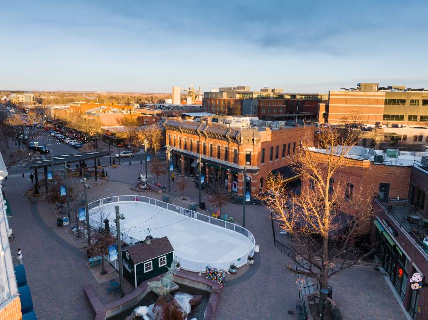 Aerial drone shot of ice skating rink in Old Town Square