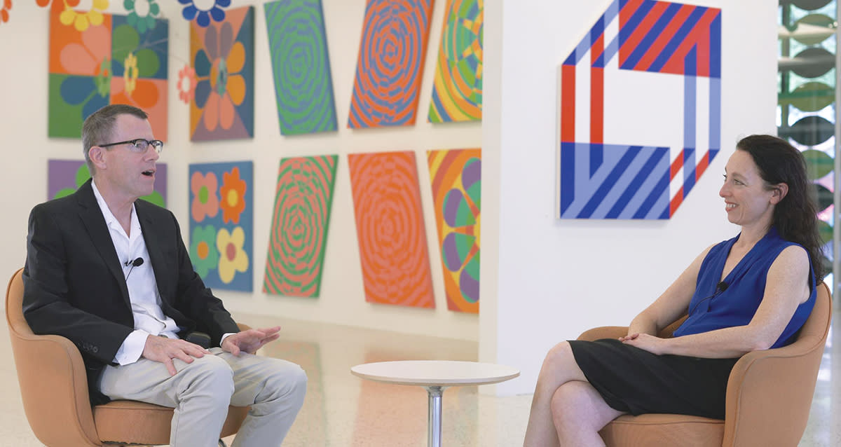 Palm Springs artist Jim Isermann and Palm Springs Art Museum Chief Curator Rochelle Steiner sit on chairs for a discussion.