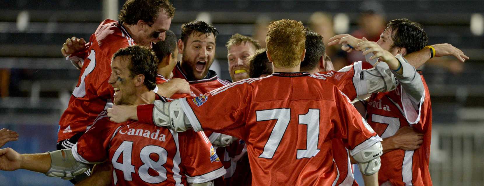 A winning team celebrates at the 2014 World Lacrosse Championships in Denver