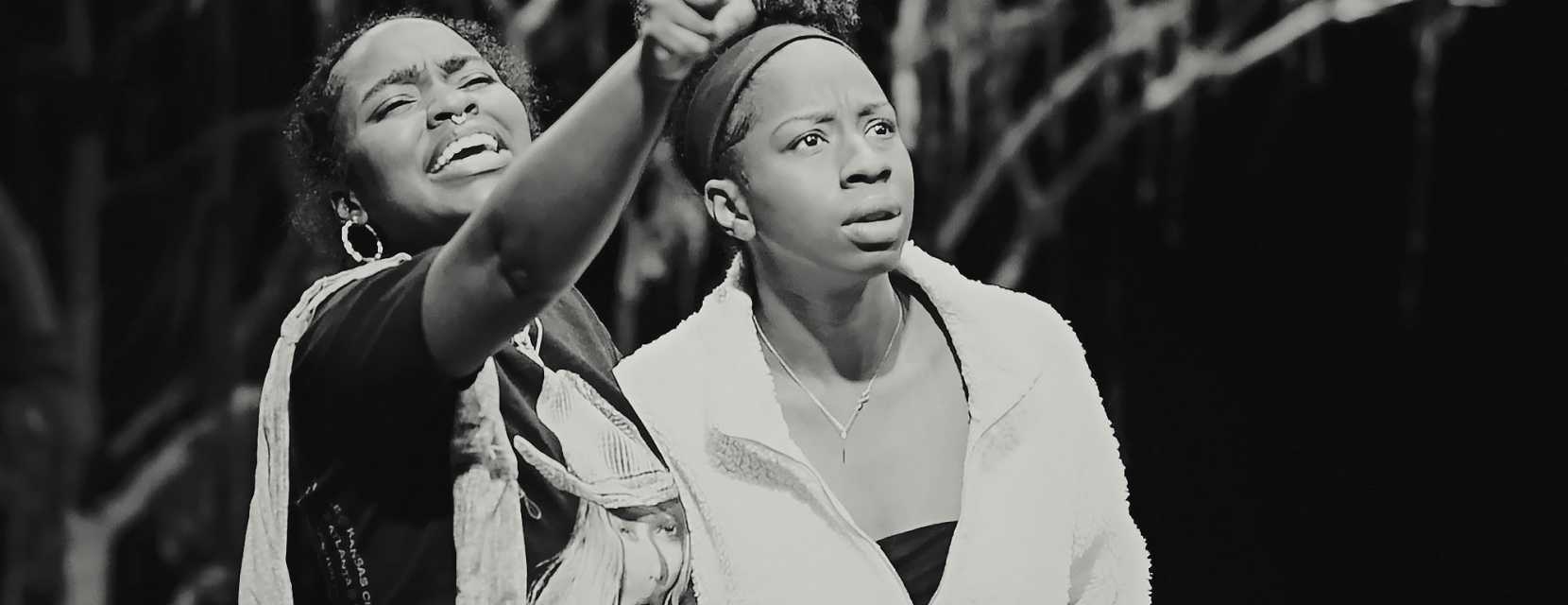 Two actors on stage perform the play "Gee’s Bend" about a small community of the descendants of the enslaved made famous for its quilts.