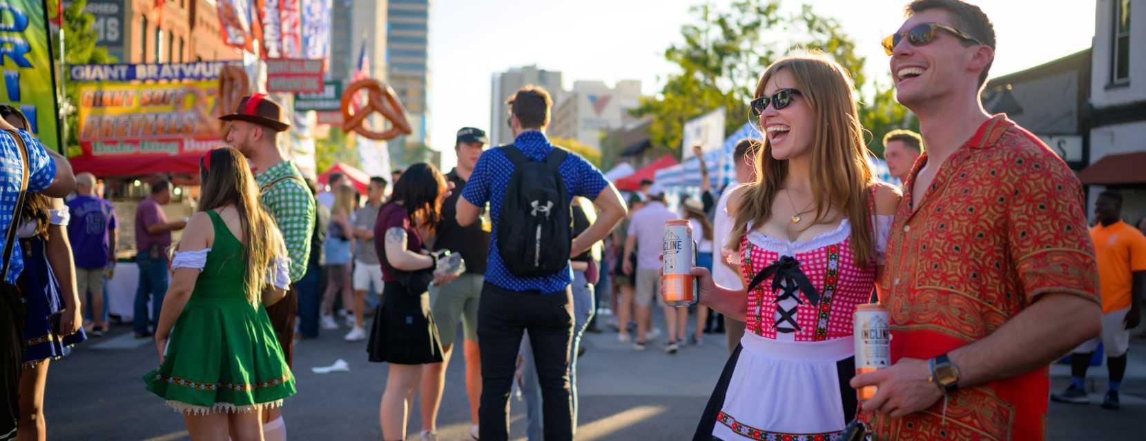 A couple enjoys live music at Denver Oktoberfest.