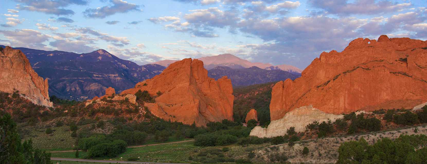 A wide landscape view of Garden of the Gods park in Colorado Springs, Colorado.