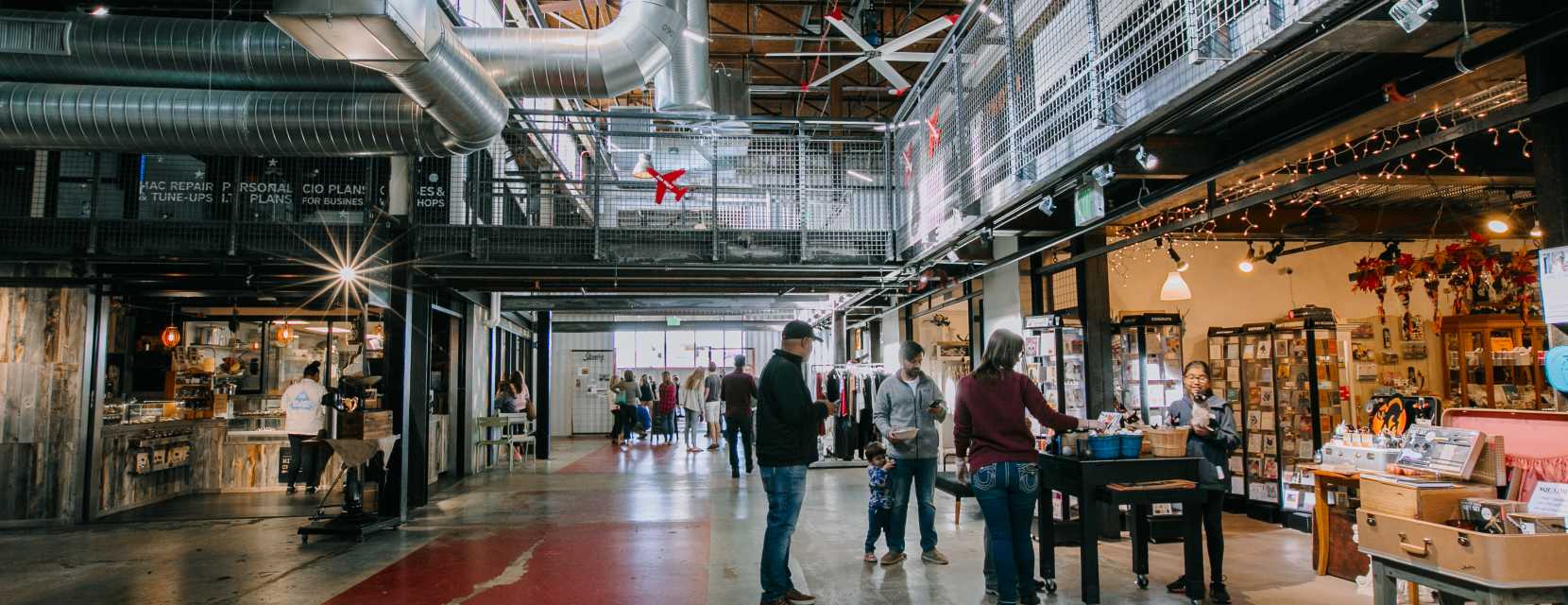 Interior view of shoppers at the industrial-inspired Stanley Marketplace near Denver, Colorado