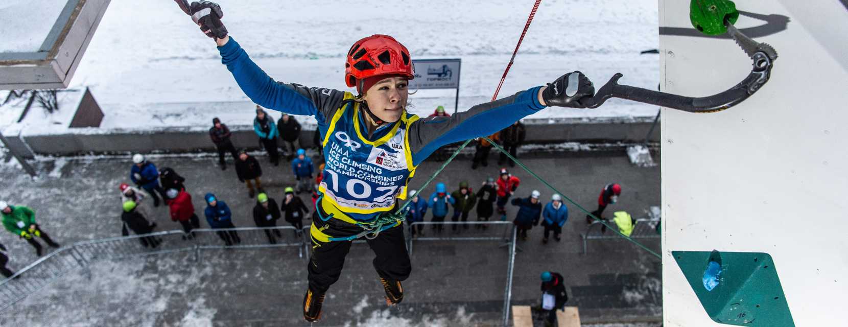 A climber hangs from a hold at the UIAA Ice Climbing in Denver
