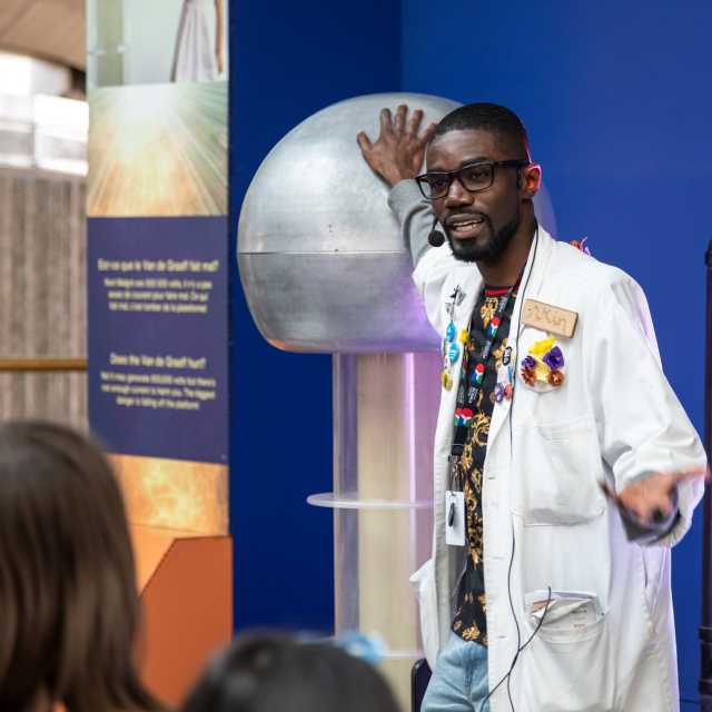 A scientist speaks at an exhibit at the Ontario Science Centre museum