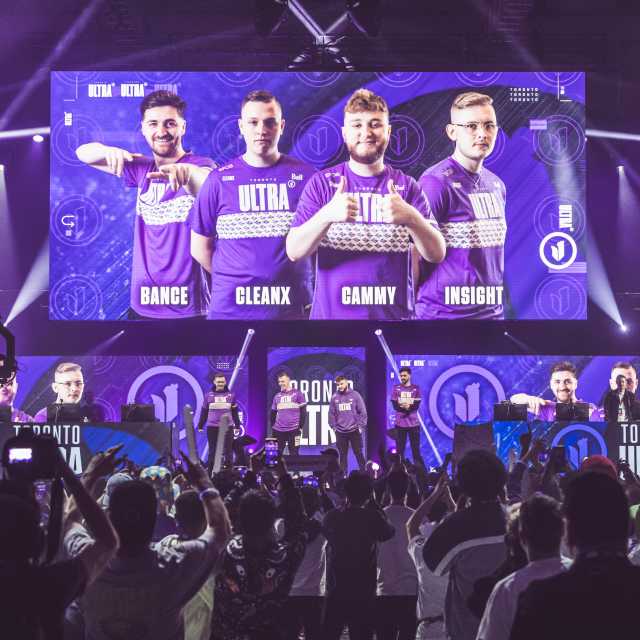 Esports tournament stage with crowd cheering