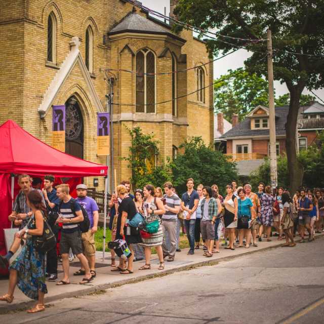 People lined up for the Randolf Theatre in Toronto for the Fringe Festival