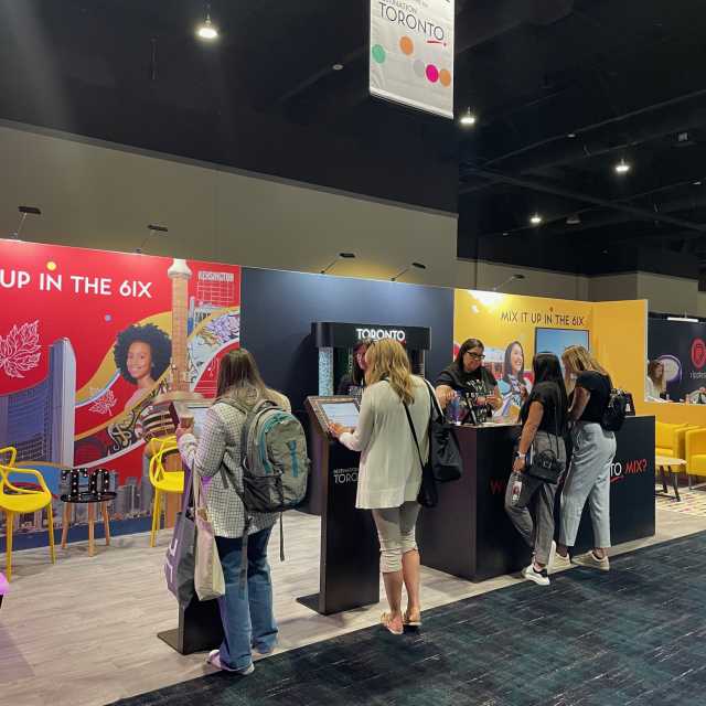 Mix it Up in the 6ix EMS activation booth with attendees