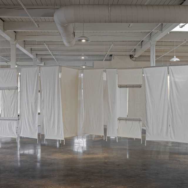 a Home for Her exhibit by Eric-Paul Riege at the Small Arms Inspection Building in Mississauga