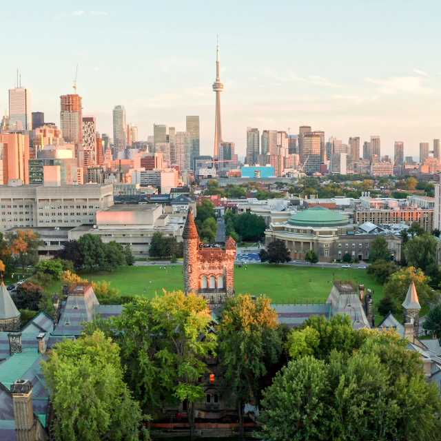 UofT Campus Aerial at sunset with Toronto skyline behind
