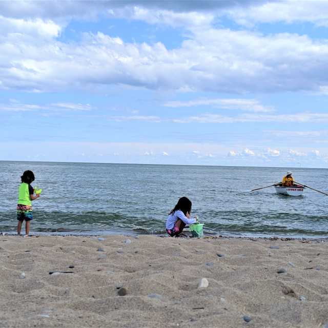 Children on the sand at Woodbine Beach in Toronto