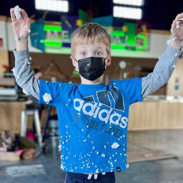 A child gets messy at Keystone Kidspace