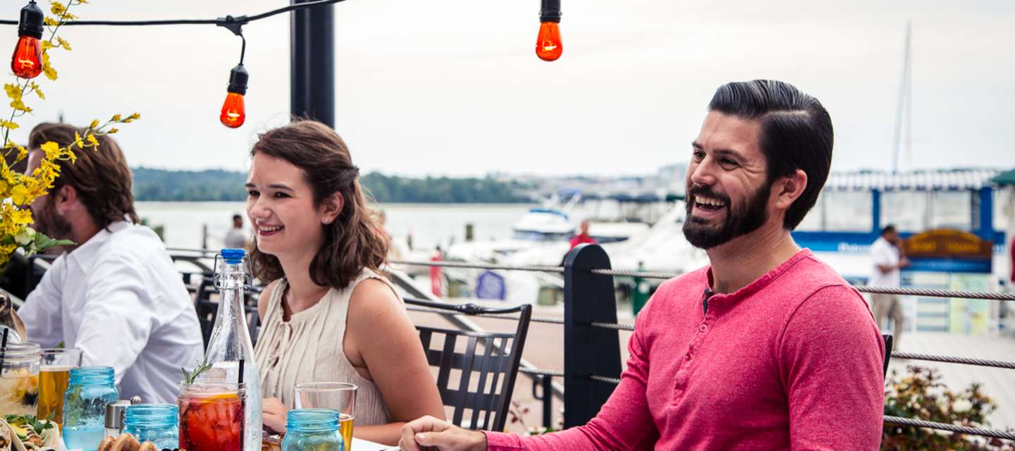 Couple Enjoying Outdoor Dining In Alexandria