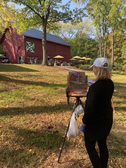 Woman art painting billsboro barn and quilt